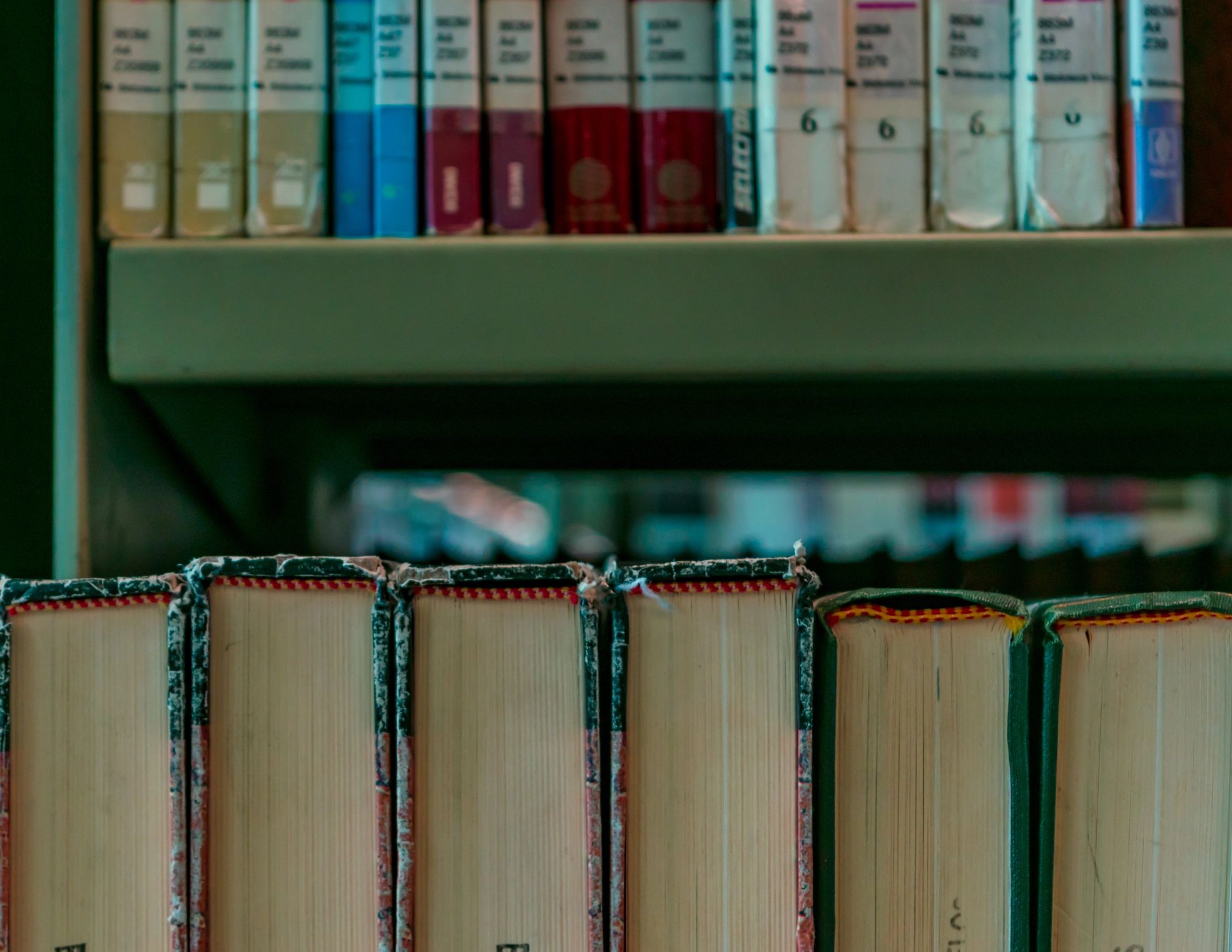 Moody library shelves reflecting StoryHub's editorial app design